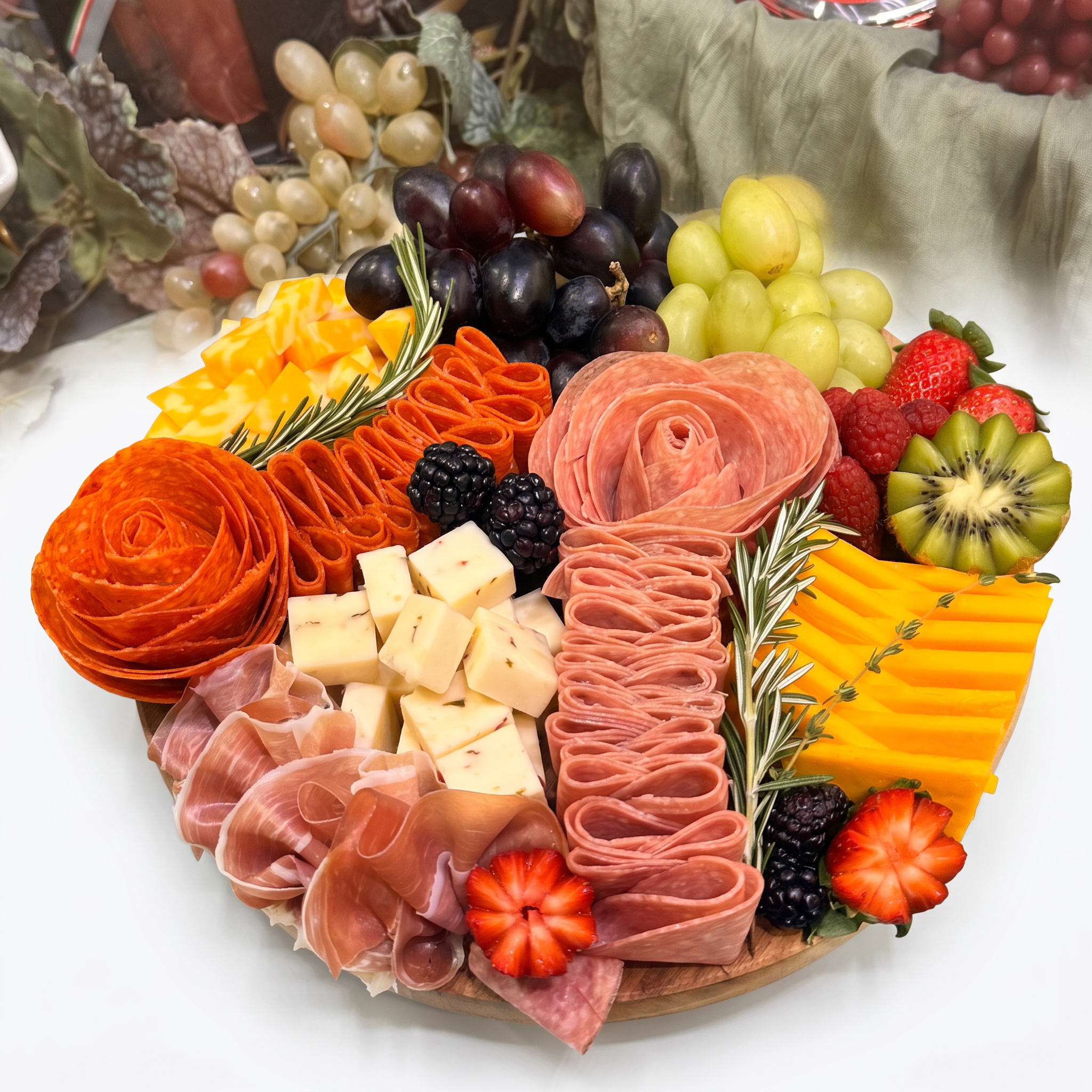 Holiday charcuterie board with salami roses and fruit
